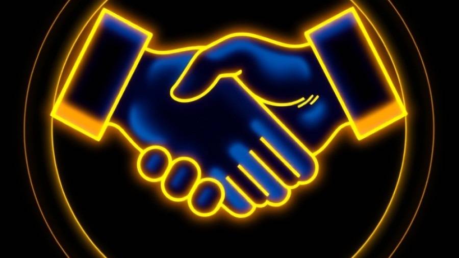 Digital Brand Handshake Logo in royal blue and golden yellow with 3D hands.
